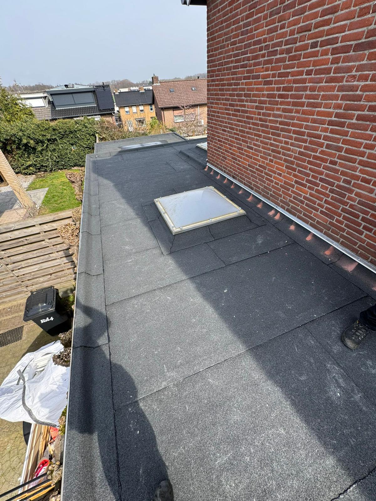 Plat dak met lichtkoepel
